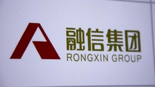融信中国：预计去年净亏损110亿至130亿元，正在对境内债务进行重组